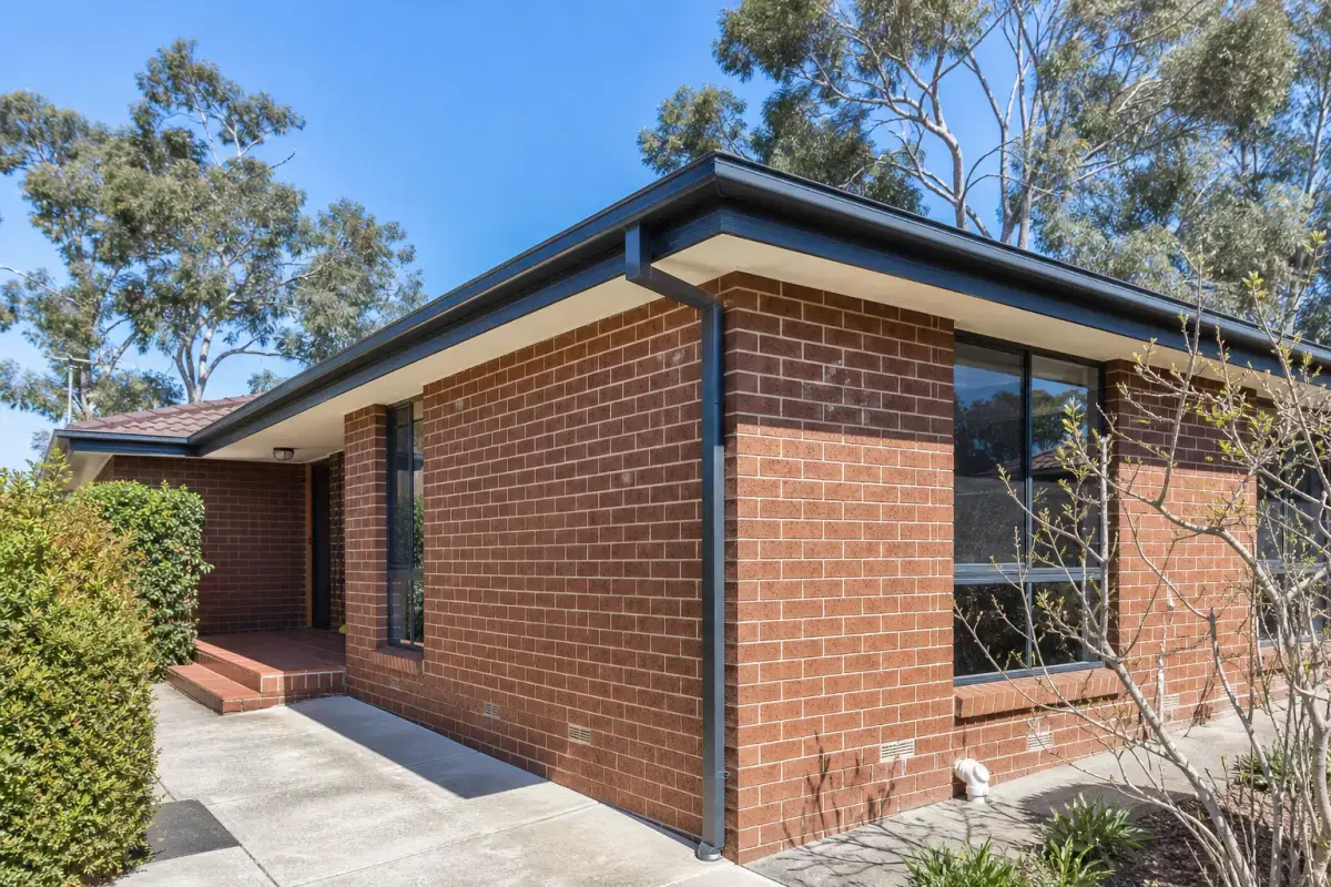 New Colorbond gutters and fascia installed on a brick home, gutter replacement in Bendigo