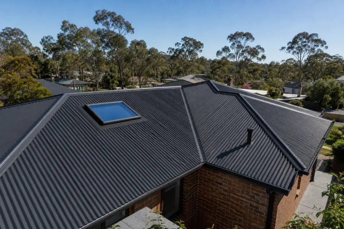 Modern flat skylight set into a Colorbond metal roof with weatherproof flashing, skylight flashing installation in Bendigo
