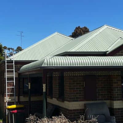Corrugated metal roof and bullnose verandah on a brick period home in the Bendigo region